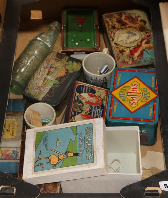 A collection of tins and vintage packaging